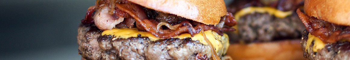 Eating Burger at Jack's Restaurant restaurant in Mccalla, AL.